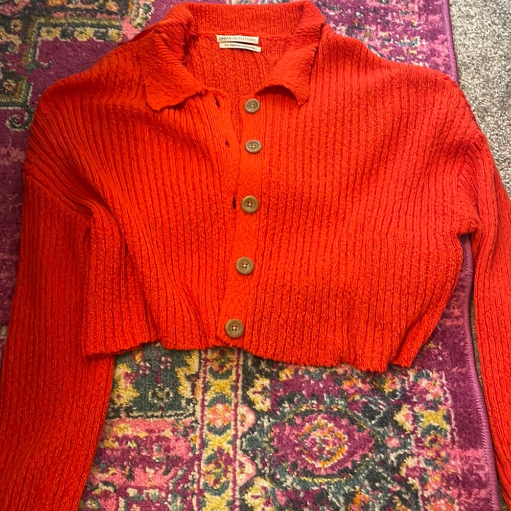 bright orange long sleeve button up sweater